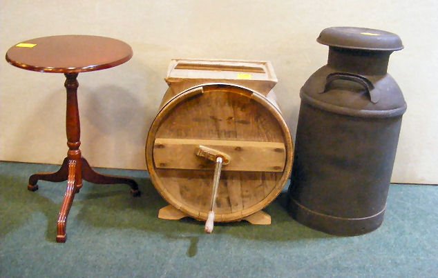 Milk can, butter churn and Bombay Co. stand: Milk can, butter churn and Bombay Co. stand