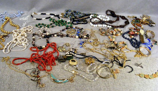 Lot of misc. costume jewelry including pins, brac: Lot of misc. costume jewelry including pins, bracelets, necklaces, cufflinks, watches, beads, etc.