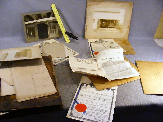 Paper lot including mid 19th century ledger book,: Paper lot including mid 19th century ledger book, and papers on two patents, electric switch and Schneider's garage door hangers 1930's
