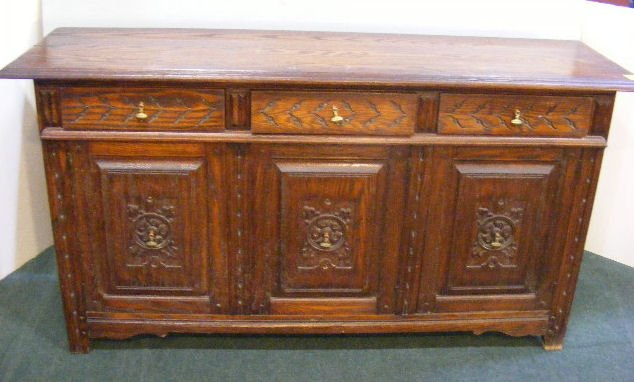 Carved oak sideboard, Eudal Oak Jamestown Lounge C: Carved oak sideboard, Eudal Oak Jamestown Lounge Co. 68" long, 35" high
