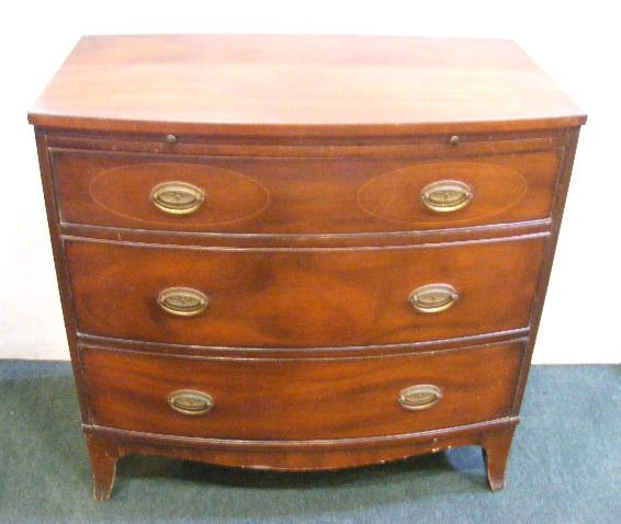 Kittinger mahogany bow front chest, inlaid on top : Kittinger mahogany bow front chest, inlaid on top drawer, veneer chips on bottom edge, draw shelf, 35" high and 36" wide.
