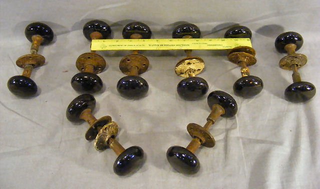 Lot of eight doorknob sets with pottery knobs, so: Lot of eight doorknob sets with pottery knobs, some minor chips
