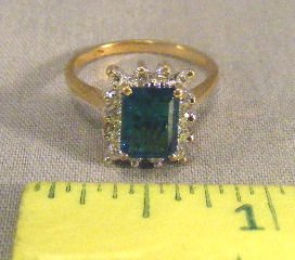 Emerald or Emerald colored stone ring 14K gold: Emerald or Emerald colored stone and diamond ring, 14K gold, size 6, 3.3 grams total weight