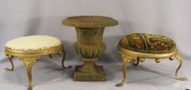 Two Victorian footstools with iron frames and cast: Two Victorian footstools with iron frames and cast iron 10" urn