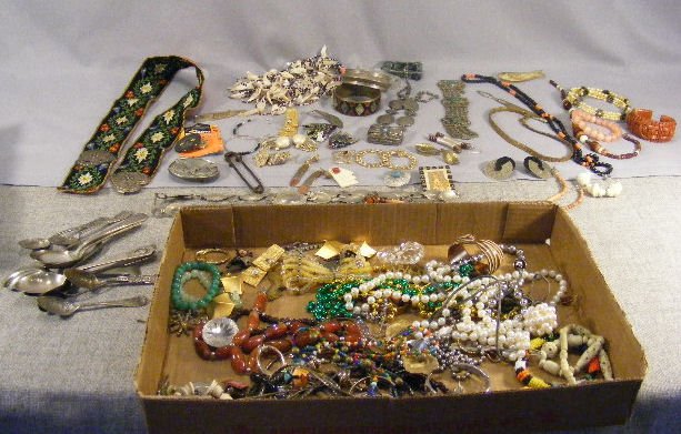 Lot of costume jewelry including belts, bracelets,: Lot of costume jewelry including belts, bracelets, necklaces, earrings, beads, silver plate souvenir spoons, etc.