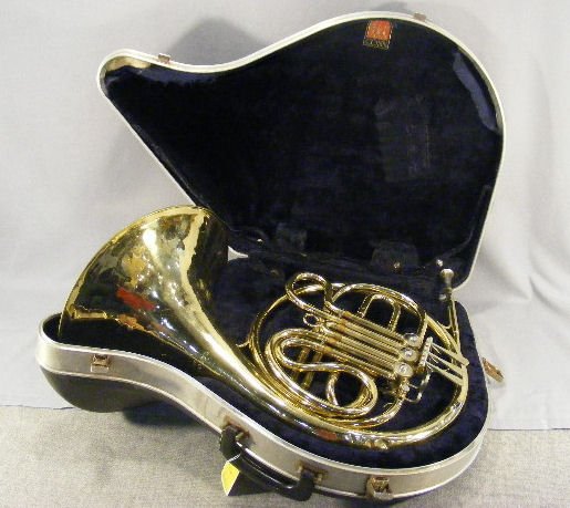 Conn French horn in case, shallow dents allover: Conn French horn in case, shallow dents allover