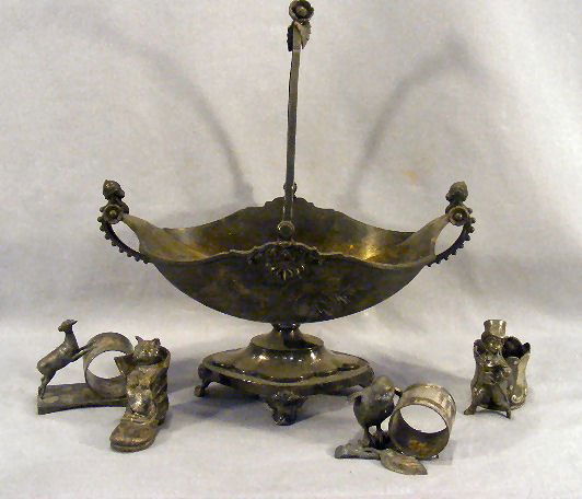 Lot of Victorian silverplate including handled bas: Lot of Victorian silverplate including handled basket, chick figural napkin ring, figural napkin ring deer (missing antlers), figural toothpick holder and Puss n Boots salt shaker