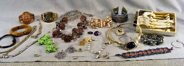 Lot of costume jewelry including beads, necklaces: Lot of costume jewelry including beads, necklaces, bracelets, silver plated spoons, etc.