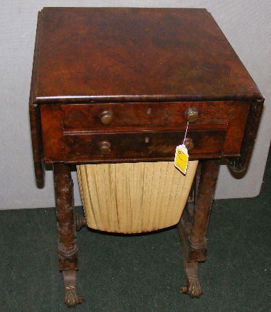 Federal sewing stand w/ lyre sides, desk drawer, f: Federal sewing stand w/ lyre sides, desk drawer, fitted drawer & basket bottom drawer, drop leaves w/ swing out arms. The top measures 39.25" across when leaves are up, (20.5" when down), 20.25" deep