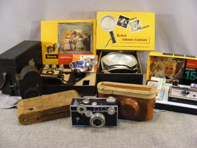 Camera lot, Bell & Howell FILMO double run eight m: Camera lot, Bell & Howell FILMO double run eight model 134-G Cine Camera, Argus Coated Cintar, Kodak Brownie & Instamatic 154, etc.
