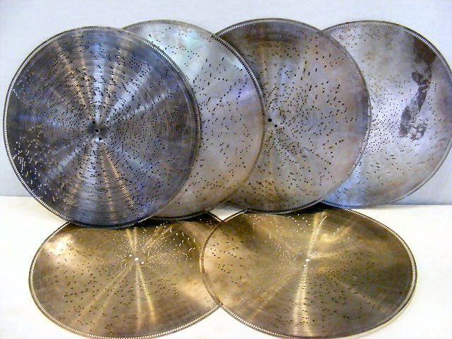6pcs. Circa 1890's steel music box disc's/ tune sh: 6pcs. Circa 1890's steel music box disc's/ tune sheets, no markings or titles, 17.25" diameter.