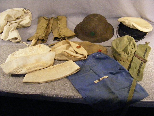 WWI era helmet w/ dented top, Navy hats, misc. ha: WWI era helmet w/ dented top, Navy hats, misc. hats, spats, belt.