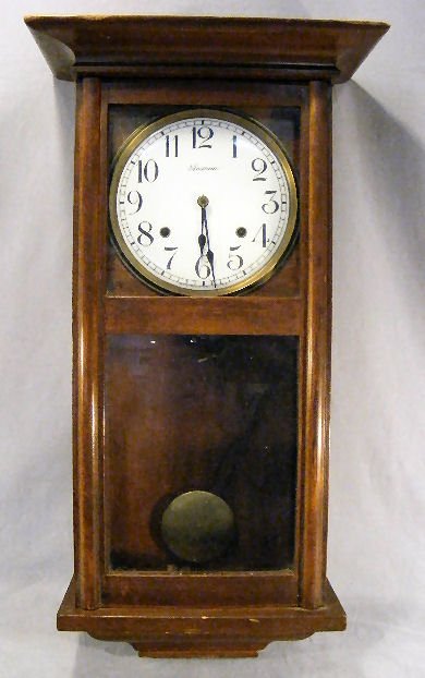 Ansonia wall clock, dial face in excellent condit: Ansonia wall clock, dial face in excellent condition, 27" long