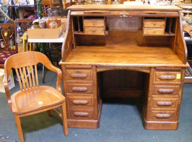 Oak "S" roll top raised panel desk, modesty panel: Oak "S" roll top raised panel desk, modesty panel, 50" wide together with oak chair