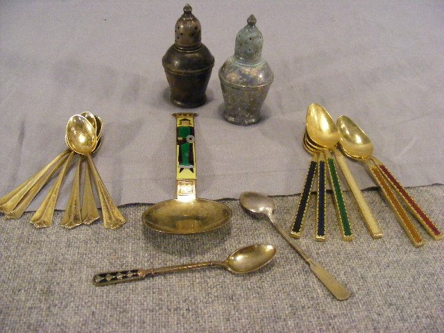 J. Tostrup 6" enameled spoon, two enameled sterli: J. Tostrup 6" enameled spoon, two enameled sterling demitasse spoons, six 830 demitasse spoons, six enameled base metal spoons, with gold wash and two sterling shakers with glass liners, total weight