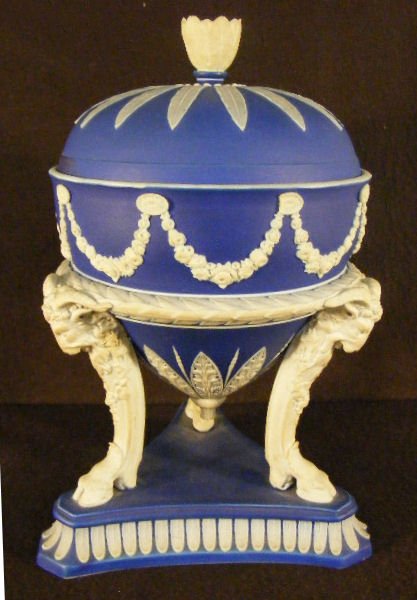 Wedgwood slip covered jar with ram head / hoof legs: Wedgwood slip covered jar with ram head / hoof legs, 10" high to top of finial, chip repair on lid, three legs broken and glued
