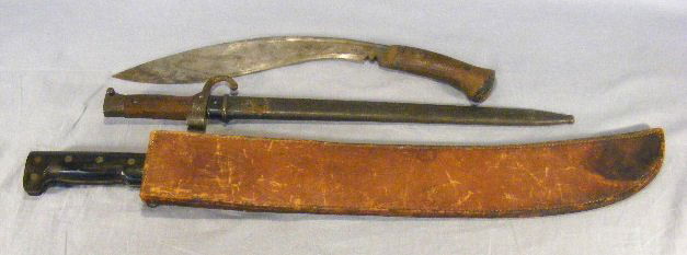 Lot including Collins & Co. WWII machete dated 194: Lot including Collins & Co. WWII machete dated 1942 with leather scabbard dated 1942, excellent condition, wood handled bolo knife marked ATD 43 and unidentified bayonet