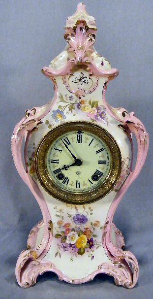 Ansonia china case clock, strike & time, porcelain: Ansonia china case clock, strike & time, porcelain dial (faint hairline above on key hole, chip on edge of back leg, 16.5" high, all clocks sold "as is"