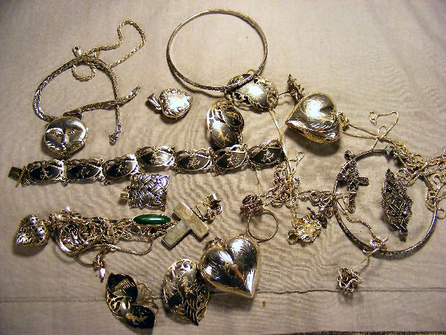 Marked & tested sterling & silver. 2 bangles, hea: Marked & tested sterling & silver. 2 bangles, heart pendants, lockets, pins, bracelet, necklace. 4.9 OZT