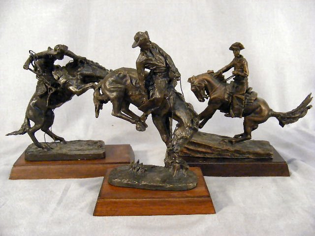 Three Frederick Remington Franklin Mint bronzes 19: Three Frederick Remington Franklin Mint bronzes 1988, approx. 6" high, Bronco Buster, The Outlaw & The Cowboy
