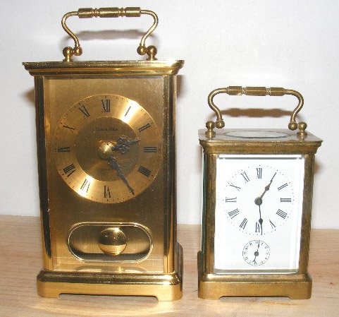 2 carriage clocks, brass, smaller one is made in : 2 carriage clocks, brass, smaller one is made in France, key wind, beveled glass. Taller clock, Ethan Allen quartz, plastic, brass, etc. (as is). Ethan Allen 6" tall, French clock 4.25"