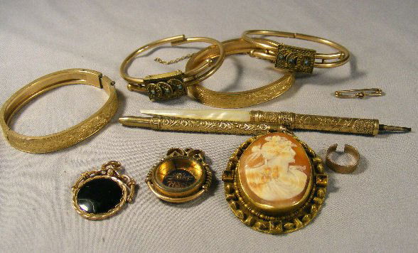 Victorian jewelry lot, cameo, 2 pens (1 w/ mother: Victorian jewelry lot, cameo, 2 pens (1 w/ mother of pearl handle), 4 bracelets, compass, knot pin & intaglio Rome soldier watch fob.