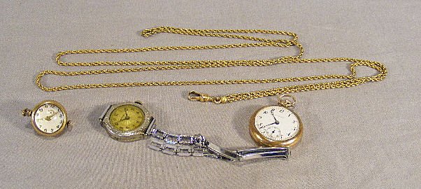Misc. watch lot including Primrose 15 jewel G.F. l: Misc. watch lot including Primrose 15 jewel G.F. ladies watch, running, gold filled Vict. watch chain, Tower ball watch, 7 jewels, running and Banner 6 jewel ladies watch, not running