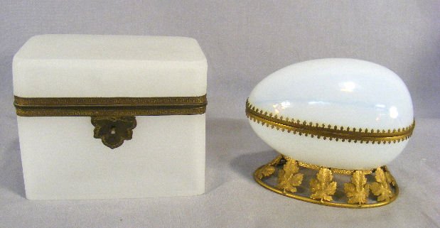 Opaline glass egg shaped jewelry box with gilt bra: Opaline glass egg shaped jewelry box with gilt brass mounts together with clambroth glass dresser box with very minor flick on base edge
