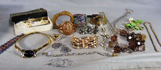Lot of costume jewelry including beads, necklaces,: Lot of costume jewelry including beads, necklaces, bracelets, silver plated spoons, etc.