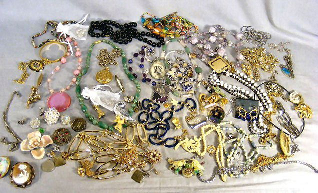 Large lot of costume jewelry including gold filled: Large lot of costume jewelry including gold filled Vict. Cameo, porcelain pin, one pair sterling earrings, necklaces, pins, bracelets, earrings and beads