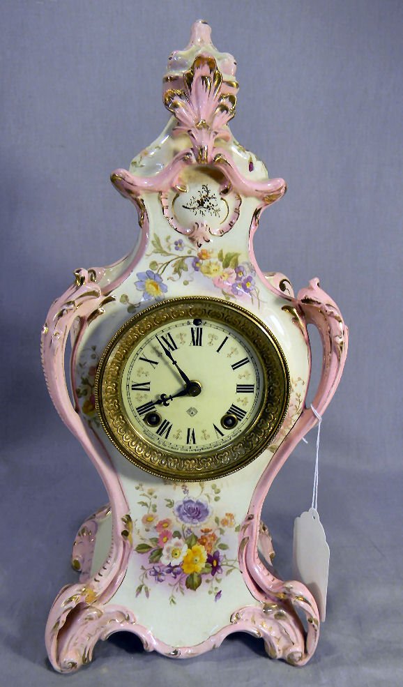 Ansonia china case clock, strike & time, porcelai: Ansonia china case clock, strike & time, porcelain dial (faint hairline above on key hole, chip on edge of back leg, 16.5" high, all clocks sold "as is"