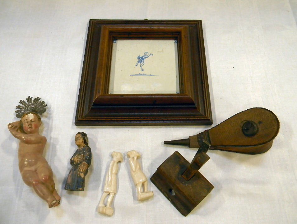 Lot including wig duster bellows, primitive route: Lot including wig duster bellows, primitive router, polychromed figure, two African bone figurines, Delft tile with glaze miss bottom left, figure of Christ child (repaired leg)