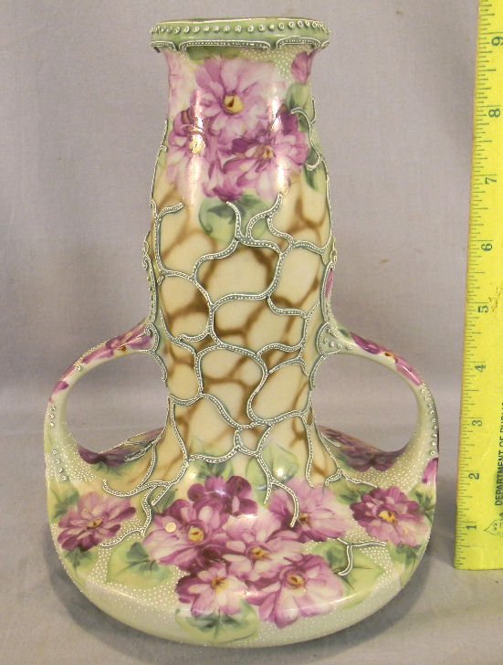 Nippon moriage vase, 9" high, very minimal loss to: Nippon moriage vase, 9" high, very minimal loss to relief, unmarked