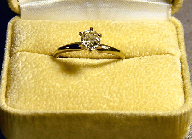 14K white gold solitaire diamond ring, approximat: 14K white gold solitaire diamond ring, approximately 1/2 carat diamond. No chips or fractures. 2.6 grams total weight. Size 7 3/4