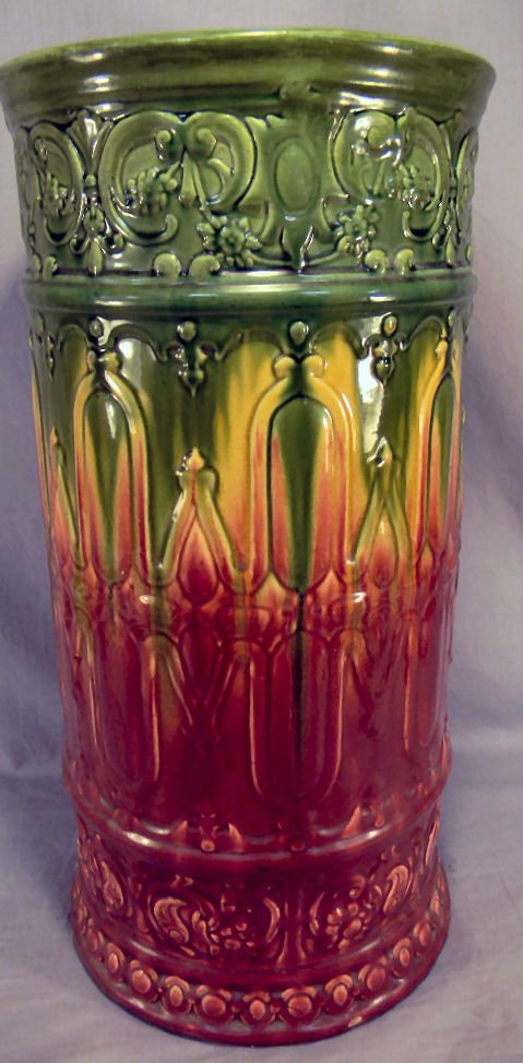 Majolica umbrella stand: Majolica umbrella stand, early 20th century, rub to color on base pictured, 21" high