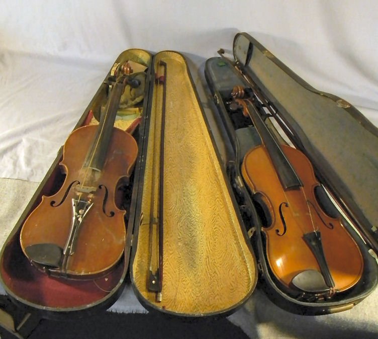 Two estate violins, first with no label, both 24": Two estate violins, first with no label, both 24" long, no cracks to either, second has labeled as copy of Stradivarius, bows unmarked