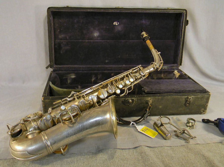 Estate C. G. CONN Saxophone, some wear to finish,: Estate C. G. CONN Saxophone, some wear to finish, sold as is