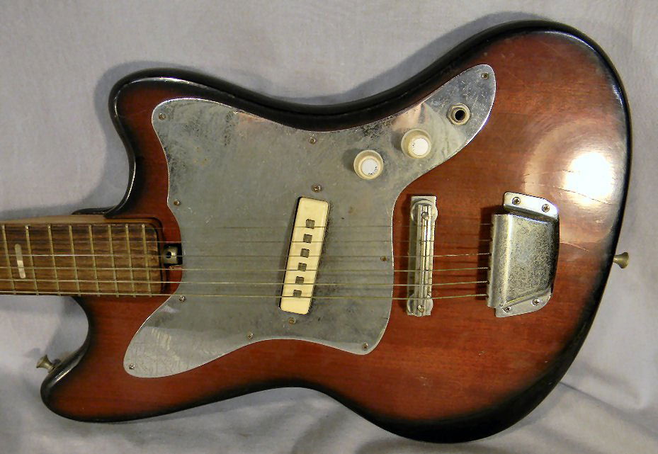 Estate Japanese electric guitar. No breaks or cra: Estate Japanese electric guitar. No breaks or cracks, finish on metal is worn, scratches and dings in finish, 39" long