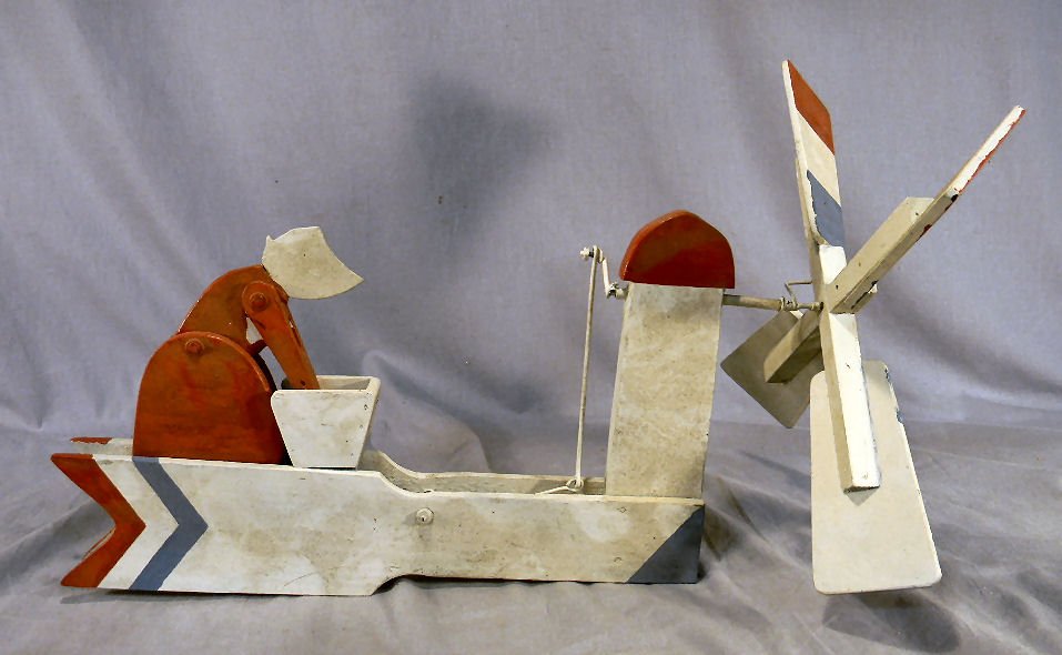 Vintage Folk Art Whirligig of washer woman, old p: Vintage Folk Art Whirligig of washer woman, old paint, operating, good condition, 18" long and 14" high