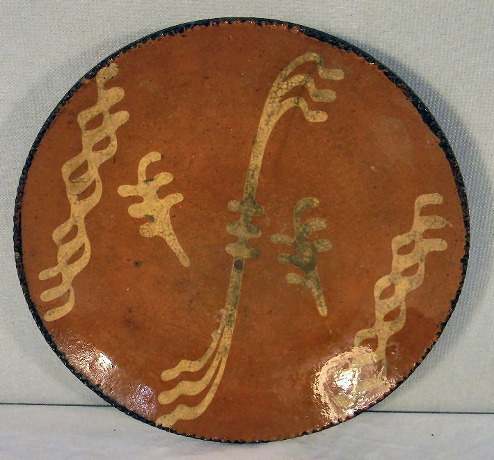 Redware 9.7" dish with yellow slip decoration, no: Redware 9.7" dish with yellow slip decoration, no cracks or chips, light crazing