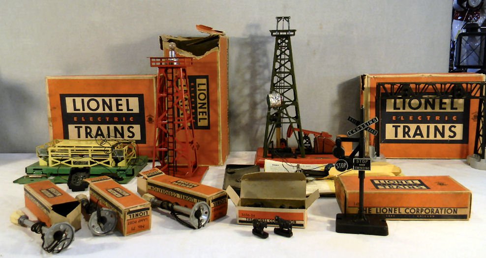 Lot of Lionel train accessories including,# 3656-: Lot of Lionel train accessories including,# 3656-34 cattle, 3 - #71 lamp posts, #3656 stockyard, #394 beacon, #140 banjo signal, #450 operating signal bridge - some boxes as is and #455 oil derrick an
