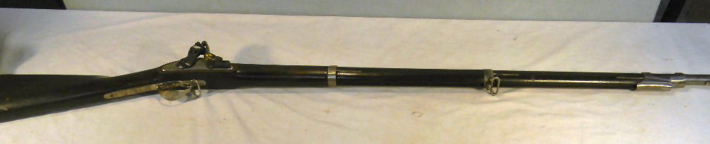 Flintlock musket made from parts of different gun: Flintlock musket made from parts of different guns, lock is stamped U.S. Springfield 1863, inspector marks on stock, barrel has been polished, measures 54 1/4 in. overall, no ram rod