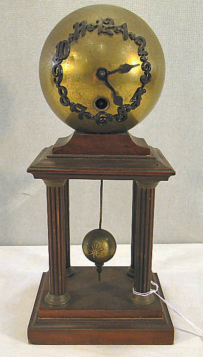 Junghans German globe clock #5341 on mahogany bas: Junghans German globe clock #5341 on mahogany base, 10.5" high, wound tight, not running