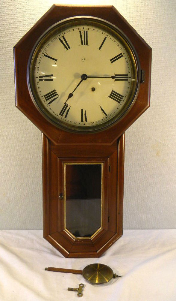 Seth Thomas long drop clock, 31" high, original l: Seth Thomas long drop clock, 31" high, original label inside, tin dial, wound tight, not running