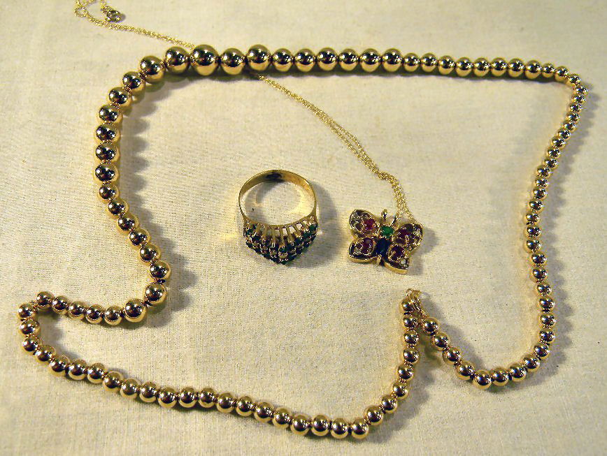 Lot including 14K gold bead necklace, 17" long, b: Lot including 14K gold bead necklace, 17" long, butterfly pendant set with stones and emerald & diamond ring size 6, 9 grams total weight including stones