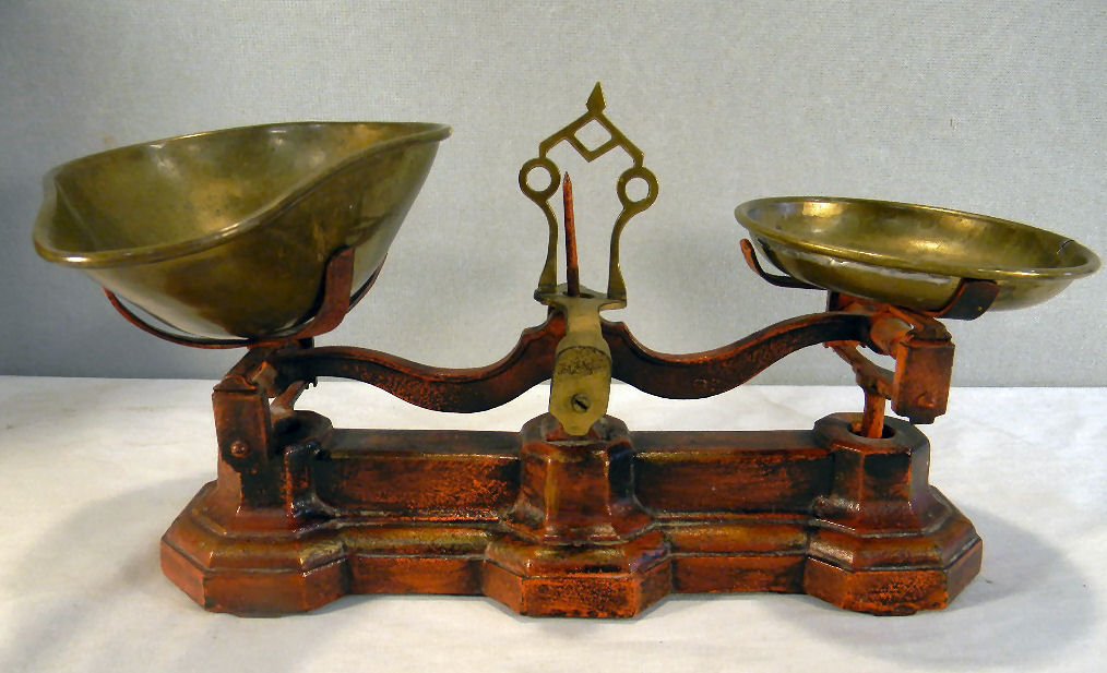 Iron balance scale, 13" long, complete with pans,: Iron balance scale, 13" long, complete with pans, European maker mark medallion