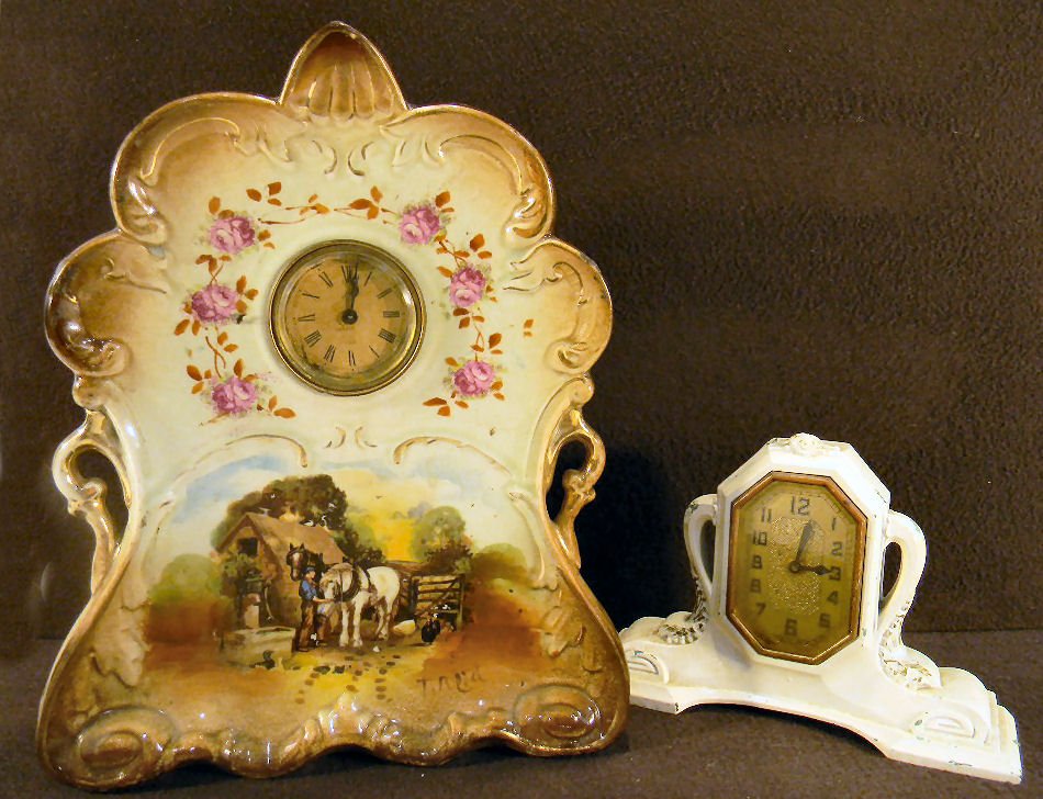 German china case clock, works not running, 12" high, n: German china case clock, works not running, 12" high, no chips or cracks together with spelter art deco styled clock, not running