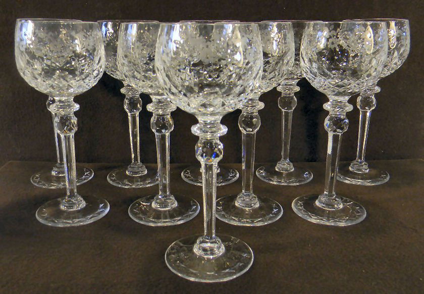 Set of ten cut and pressed 8" wine hocks, wheel cut flo: Set of ten cut and pressed 8" wine hocks, wheel cut floral decoration on bowls, no chips or cracks