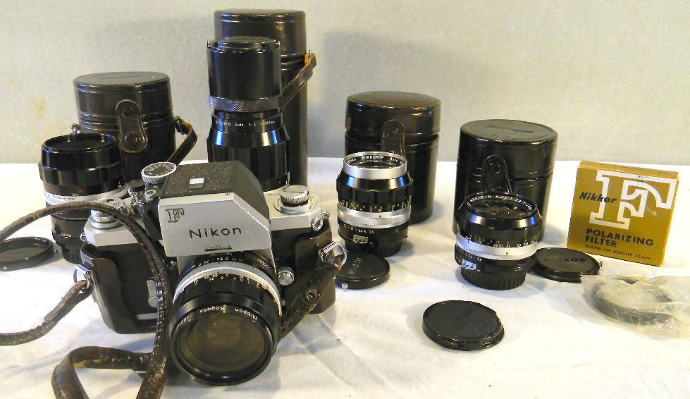 Nikon F 35mm camera with Nikkor lenses shown, all lense: Nikon F 35mm camera with Nikkor lenses shown, all lenses in good condition
