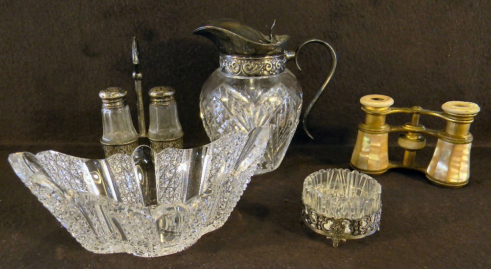 Misc. lot including cut glass salt with sterling base, : Misc. lot including cut glass salt with sterling base, small cut glass bowl, salt & pepper shakers in sterling frame (dents) and cut glass syrup jug with silver plated cap, no glass damaged, mother of